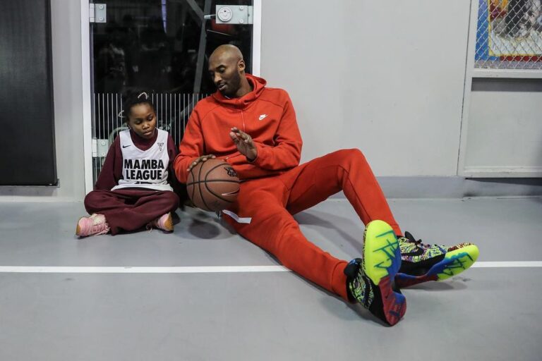 Kobe Bryant with a kid