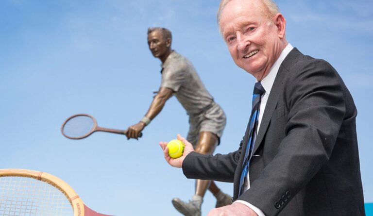 Rod Laver with his statue